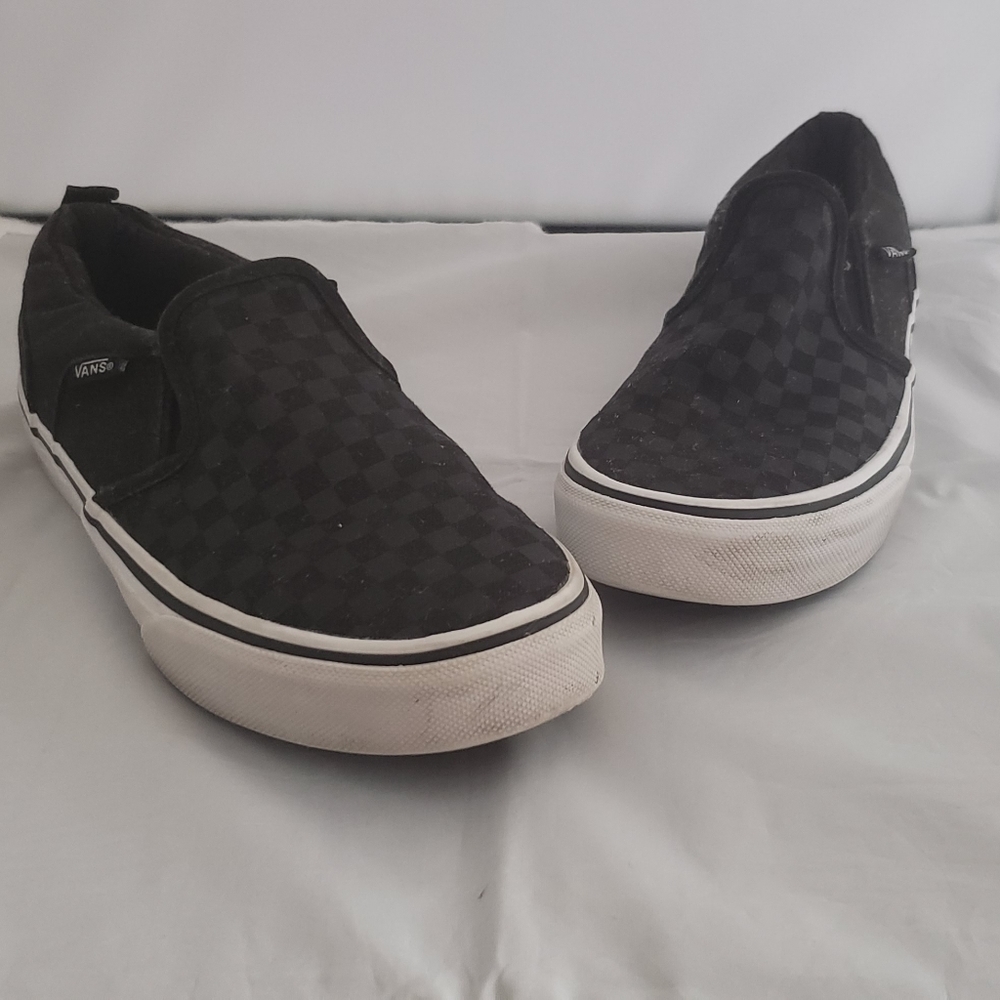 Black checkered slip ons